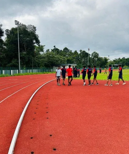 Candidates running on a training track